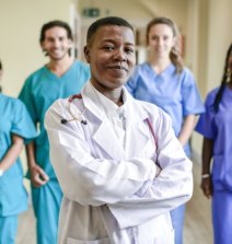 doctor with nurses behind